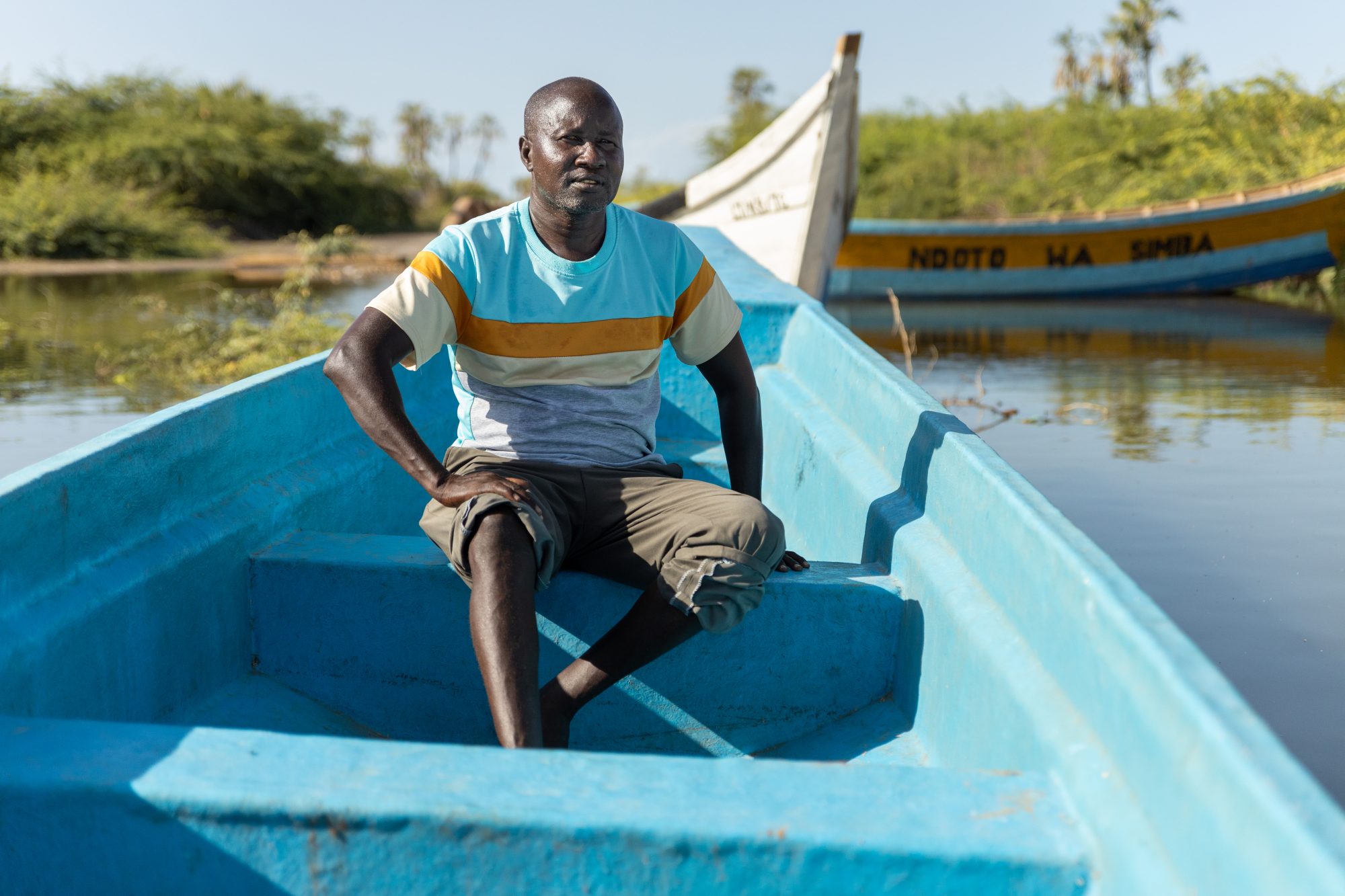 Francis Kebo, one of the beneficiaries of the boats donated by DCA along Natole shores.